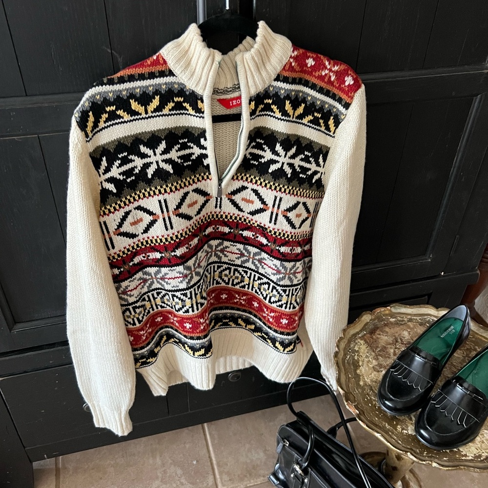 Timeless Izod sweater probablyy men’s so oversizeded fit for woman.